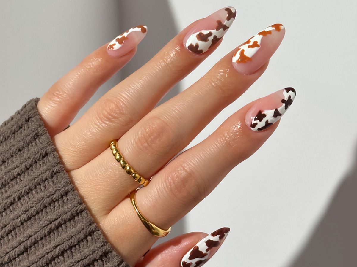 19 Animal Print Nail Designs For A Fierce Manicure 7 20 Cow Print Nail Designs for a Playful Take on a Neutral Manicure