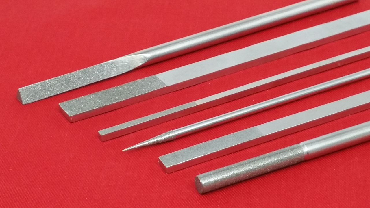How To File Your Nails Perfectly For An At Home Mani 7 Diamond Hand File 1/4" Triangular 100 Grit - Triatic, Inc.