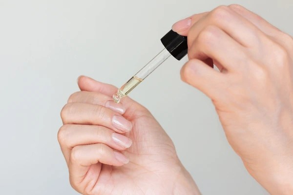 Your Guide To Treating and Preventing Brittle Nails 7 6+ Hundred Cuticle Oil Dropper Royalty-Free Images, Stock Photos & Pictures | Shutterstock