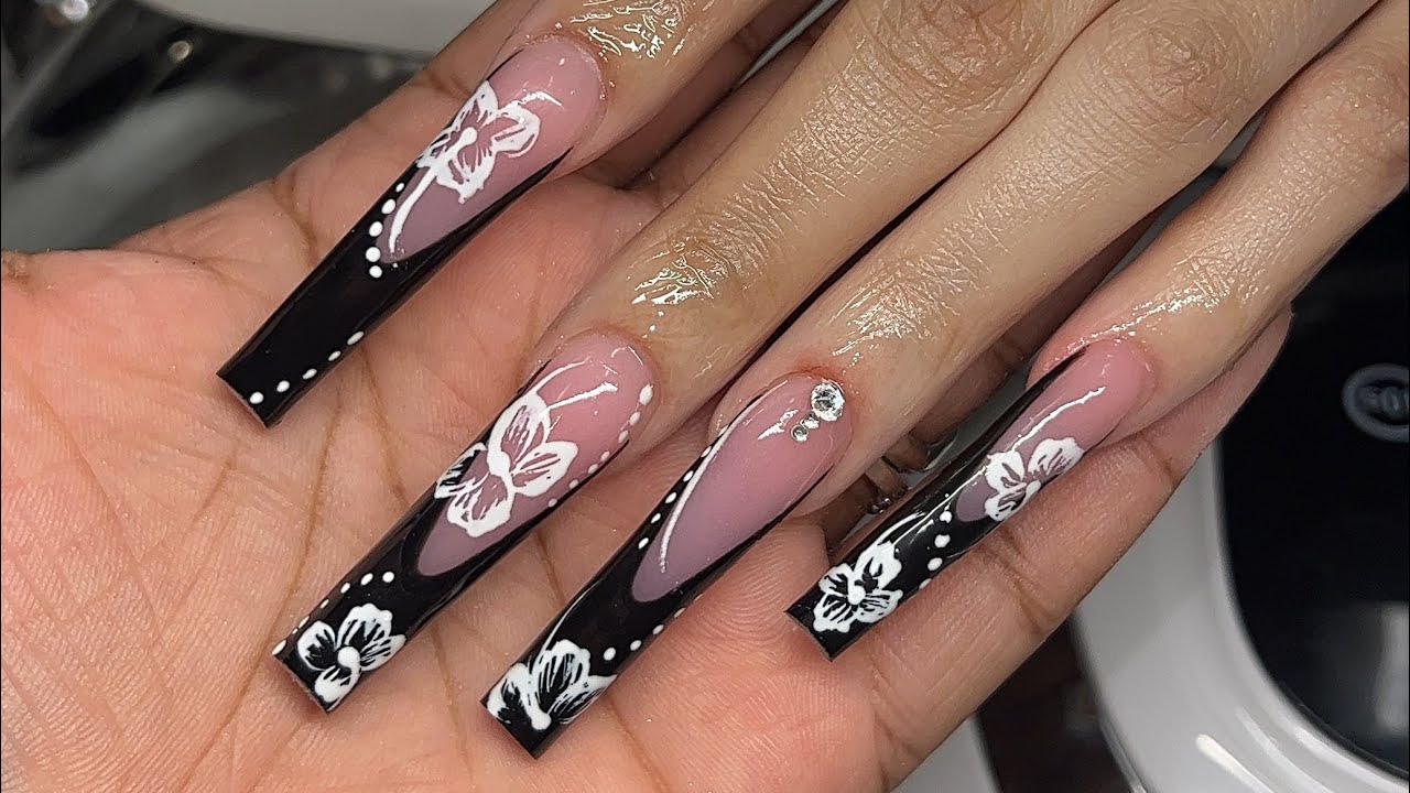 20+ Beautiful Summer Travel Nail Ideas In New York 7 Hand Drawn Black French w/ Hibiscus Flowers 🖤✨ Black French | Hibiscus Flower Nails | XXL Nails